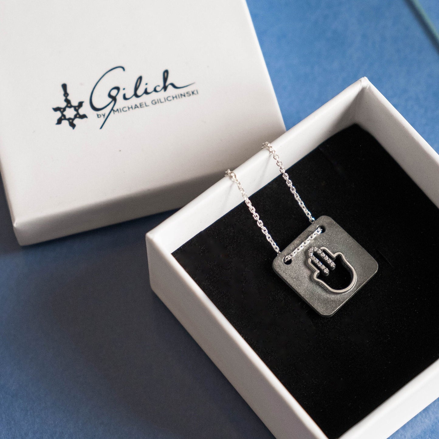 Modern Hamsa Necklace with natural diamonds