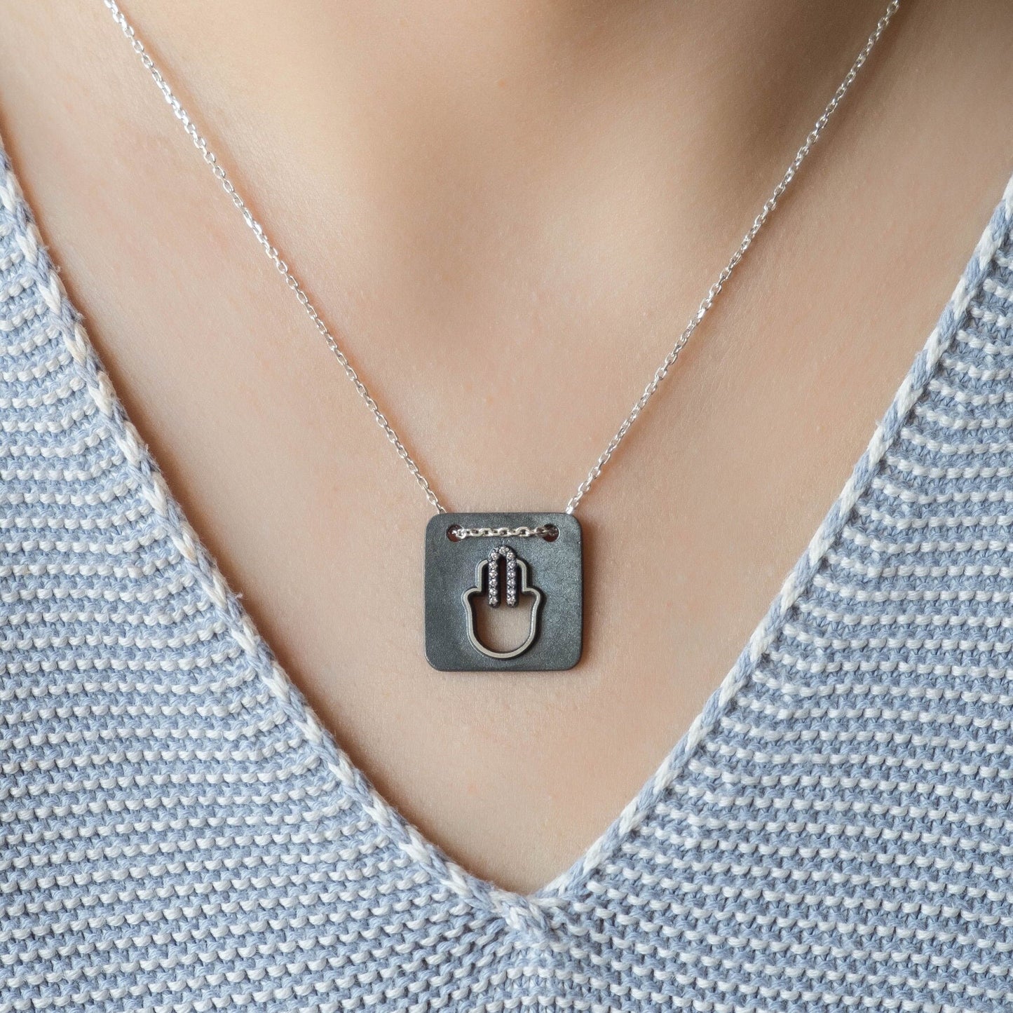Modern Hamsa Necklace with natural diamonds