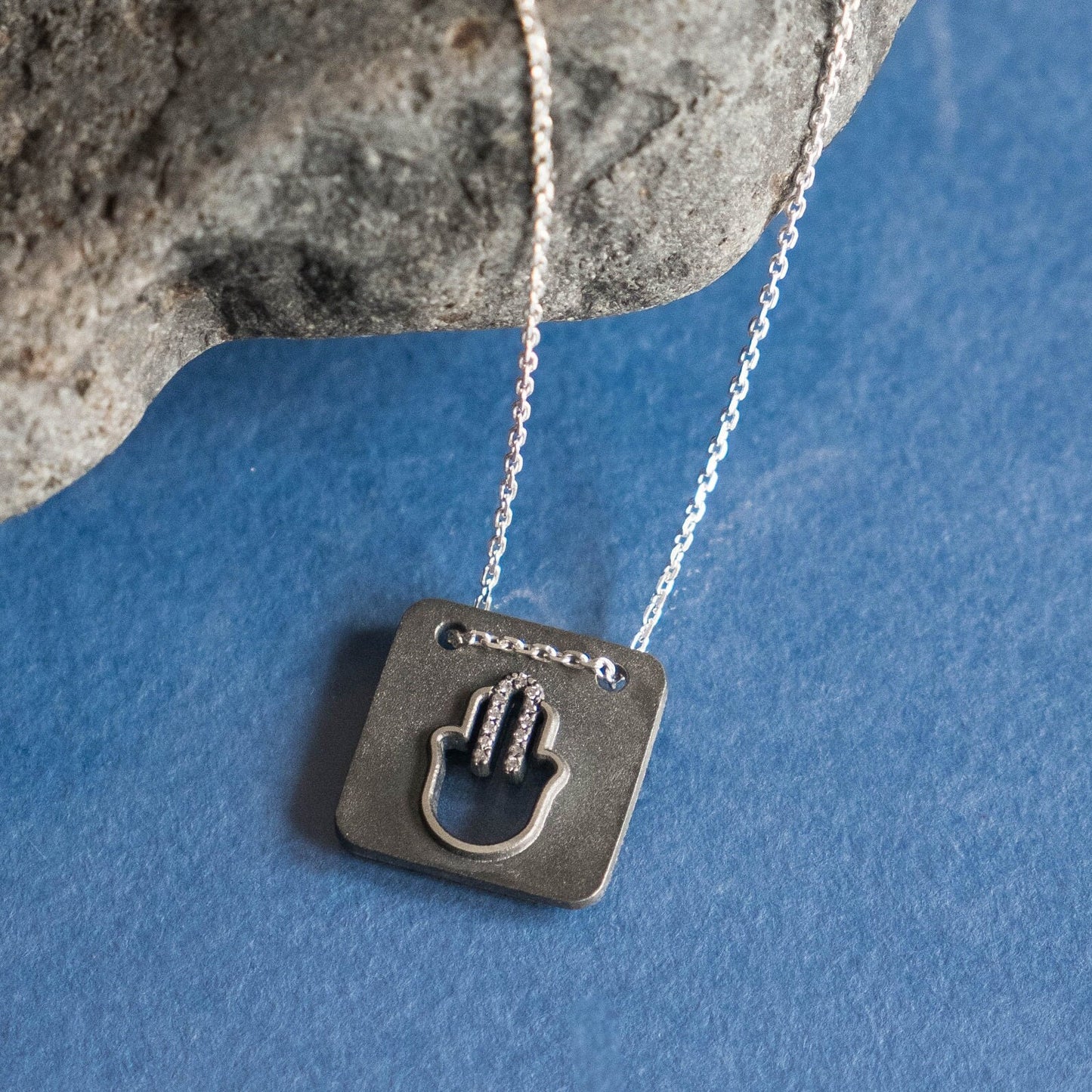 Modern Hamsa Necklace with natural diamonds