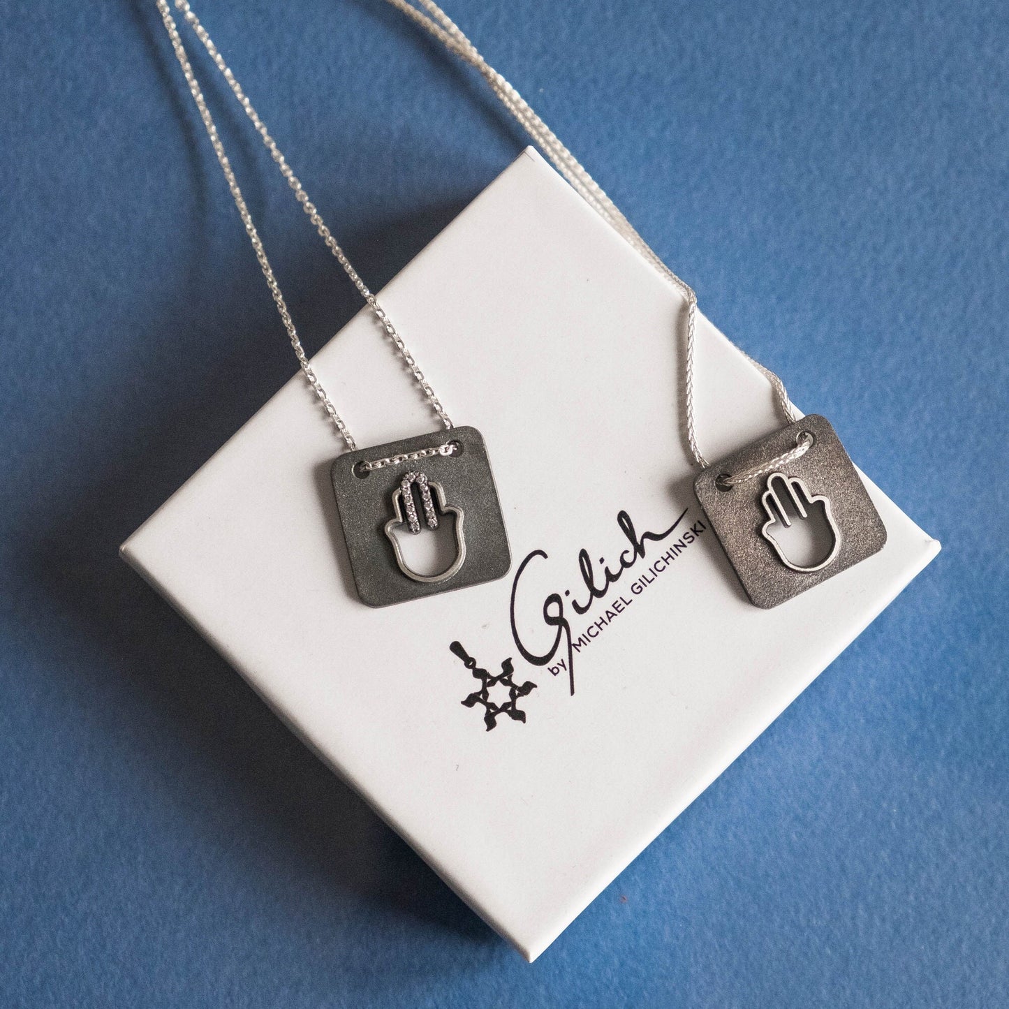 Modern Hamsa Necklace with natural diamonds